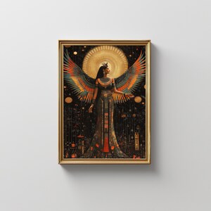 May include: Framed artwork depicting an Egyptian-inspired figure with large, colourful wings. The figure wears a detailed gown and jewellery, set against a dark, starry background with golden accents. The artwork is enclosed in a gold frame.
