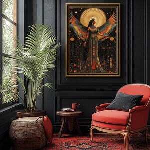 May include: A framed artwork featuring a figure with large, colourful wings, set against a golden sun and celestial elements. The artwork is displayed in a room with a red rug, a red armchair, and a potted plant.