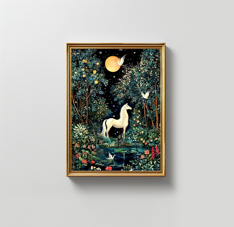 May include: A framed wall art print featuring a white unicorn standing in a dark forest by a pond under a full moon. The scene includes lush green trees, small white birds in flight, and colorful flowers near the water's edge, all encased in a gold frame.