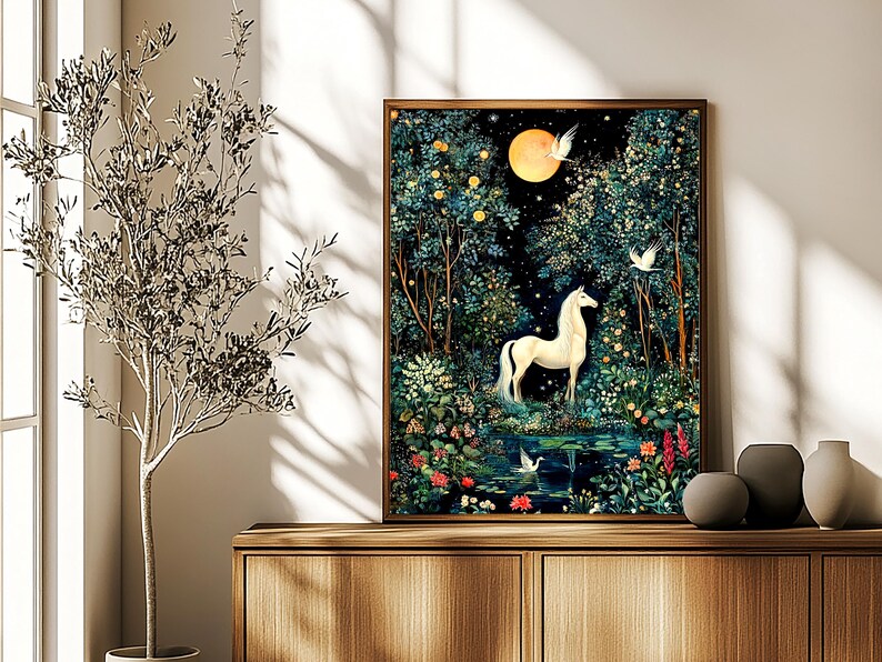 May include: A framed rectangular wall art print featuring a white horse standing in a dark, lush forest at night. A bright yellow full moon illuminates the scene, surrounded by dense trees, colorful flowers, and a small pond with white birds.