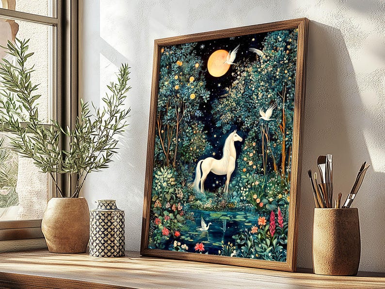 May include: A framed vertical wall art print featuring a white unicorn standing in a lush, dark forest at night. A large, glowing yellow moon hangs in the sky above the unicorn, surrounded by dense trees, colorful flowers, and white birds.