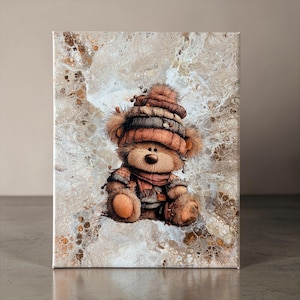 May include: A canvas print featuring a whimsical teddy bear illustration. The bear is depicted wearing a cozy brown hat, scarf, and sweater. The background has a textured, abstract design with shades of brown and white. The artwork is a charming piece of home decor.