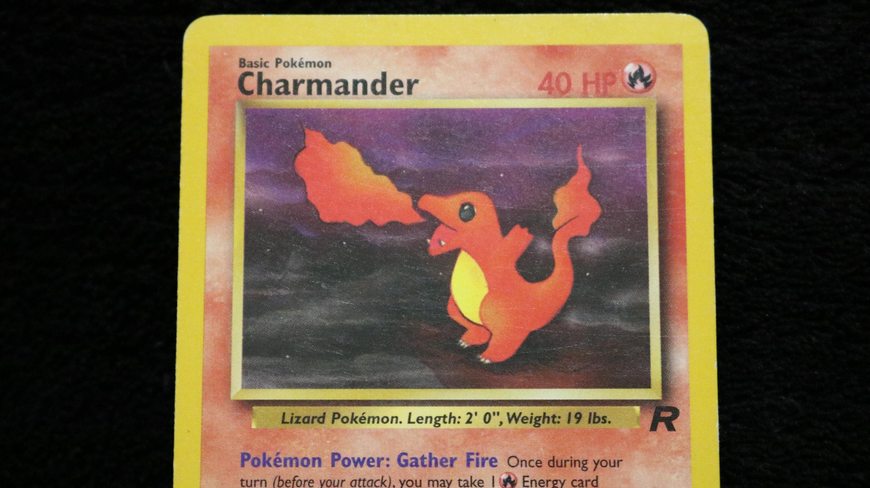 charmander first edition pokemon card 2000 Pokémon Rocket Charmander 1st Edition PSA 9 – PokePower main image 0