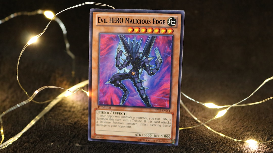 are yugioh cards evil Eye Confrontation - INCH-EN035 Super Rare You can banish 1 DARK monster in your Graveyard to target 1 Level 4 or lower LIGHT monster your opponent controls Evil HERO Adusted Gold -