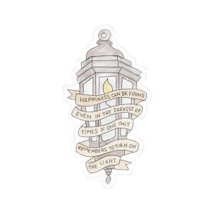May include: A sticker featuring a gray lantern with a lit candle inside. A banner wraps around the lantern with the text: "HAPPINESS CAN BE FOUND EVEN IN THE DARKEST OF TIMES IF ONE ONLY REMEMBERS TO TURN ON THE LIGHT."