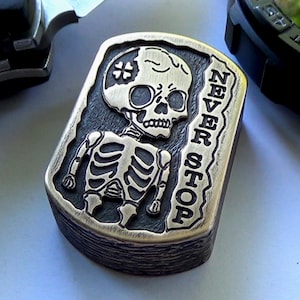 Brass Skeleton Motivational Coin: Never Stop Pocket Fidget Worry Stone