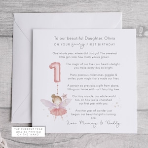 May include: A first birthday card for a daughter, featuring a pink number one balloon and a fairy illustration. The card includes the text: "To our beautiful Daughter, Olivia, on your fairy first birthday."