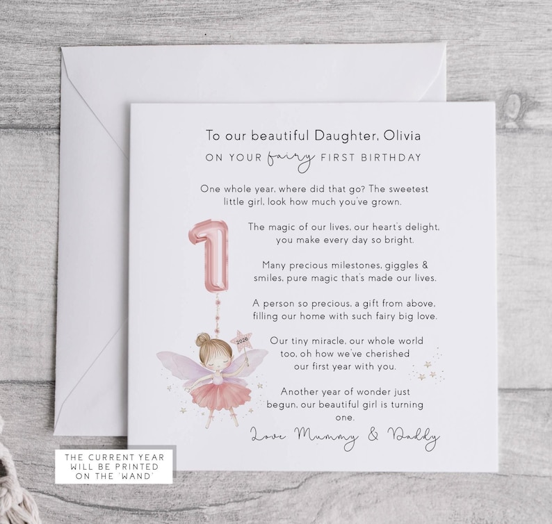 May include: A first birthday card for a daughter, featuring a pink number one balloon and a fairy illustration. The card includes the text: "To our beautiful Daughter, Olivia, on your fairy first birthday."