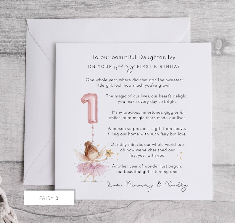 May include: A first birthday card with a fairy theme. The card features a pink number one balloon and a fairy illustration. The text reads "To our beautiful Daughter, Ivy, on your fairy first birthday."