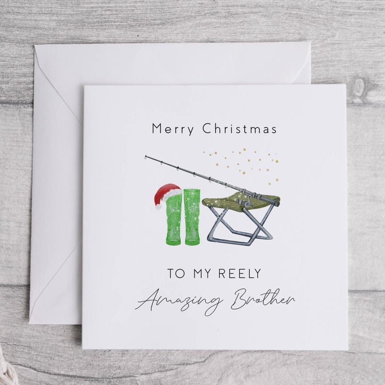 May include: A white Christmas card with a green fishing boot, a fishing rod, and a folding chair. The card says "Merry Christmas" and "To my Reely Amazing Brother".