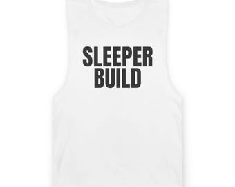 May include: A white sleeveless vest top featuring the text SLEEPER BUILD printed in bold black capital letters across the centre of the chest. The garment has a round neckline and wide shoulder straps, presenting a clean and simple design.