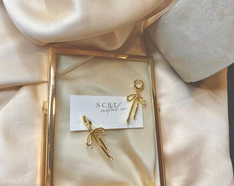 18K ゴールドフィルド リボン ボウ ハギーズ | ゴールドフィルド ボウ | ゴールドフィルド ハギーズ | ゴールドフィルド ジュエリー | ボウ イヤリング | ハンドメイド イヤリング