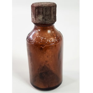 Vintage Amber Brown Lysol Bottle 4 inches with original lid rusted lid