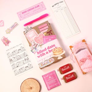 Blind date with a kindle book styled as kindle mystery box featuring blind date with an ebook concept, book bundle presentation, bookish bundles layout, and book gift box aesthetic for digital reader gifts, perfect gift box for women and blind date with a book kindle fans.