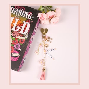 May include: A set of three ceramic mugs with a speckled, matte finish. The mugs are in shades of cream, light gray, and dark gray. Each mug has a simple, minimalist design, perfect for coffee or tea.