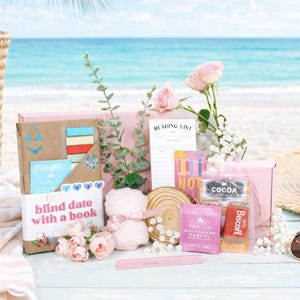 Blind date with a book box styled as a luxury book gift box and book mystery box for women, featuring wrapped mystery book, book bundle details, blind book box aesthetic, bookish bundles, and book accessories for book lover gifts, perfect gift box for women and date night with a book experience.
