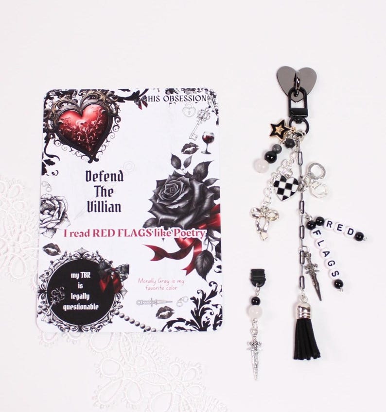 Decorative kindle accessories arranged beside a kindle clear case including cute kindle charm, kindle dust plug charm, and charm keychain attachment. The featured watercolor kindle insert shows how kindle inserts transform a kindle paperwhite aesthetic. Perfect for readers who decorate their kindle case with kindle stickers, kindle skins, kindle decorations, and cozy booklover gifts inspired by blind date book mystery box trends.