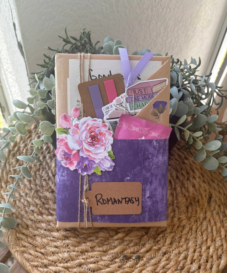 Blind Date with a Book is the ultimate gift for readers! A surprise mystery book from genres like dark romance, paranormal, or romantic fantasy, wrapped with clues. Includes herbal tea, bookish stickers, highlighter, annotation tabs, book tracker, and a library-style reading list. A perfect surprise gift for book lovers, booktok books, book clubs, and fans of spicy or thrilling romance books. Great for all ages and reading preferences!