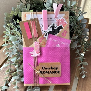 Blind Date with a Book is the perfect surprise for book lovers! A mystery book is selected based on your chosen genre, such as romantasy, thriller, or paranormal. Includes blind date-style packaging, herbal tea, annotation tabs, a highlighter, bookish stickers, a book tracker, and a library-style reading list. Perfect for booktok books, dark romance, spicy reads, fans of fantasy or sci-fi, and anyone who enjoys a fun and unique reading adventure.