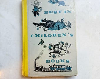 Könnte beinhalten: Ein Vintage-Buchcover mit gelbem Rücken. Das Cover zeigt Illustrationen eines Cowboys, einer Ratte, eines Zuges und den Text "Best in Children's Books".