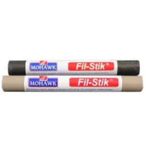 May include: Two wood filler sticks, one brown and one beige, labeled "Fil-Stik" by Mohawk.