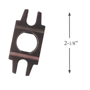 May include: A dark brown metal tool with a central circular opening and two pairs of projecting tabs. The tool is 2-1/8 inches in length, as indicated by the measurement arrow.