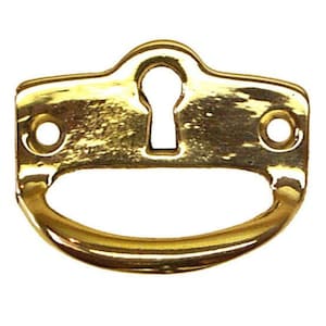 May include: A polished brass drawer pull with a keyhole and a curved handle. The hardware has two small holes on either side of the keyhole for mounting. The pull is designed for furniture and cabinets.