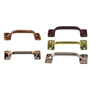 May include: Four cabinet pulls in different finishes: brass, bronze, polished nickel, and satin nickel. Each pull has a rectangular shape with rounded edges and a slight curve in the center.