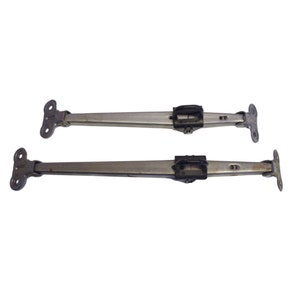 May include: Two silver metal cabinet door stay supports with black plastic hinges. The supports are extended and ready to be installed.