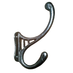 May include: A silver cast iron hook with a decorative design. The hook has a curved shape and a rounded end.