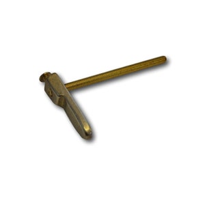 May include: A gold-toned metal toggle bolt with a threaded shaft and a lever-style handle. The bolt is designed for use in drywall or other soft materials.