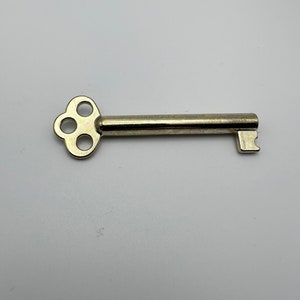 Skeleton Key - Vintage Style 3-Hole Charm, Antique Bronze Finish, Barrel Design, Classic Historical