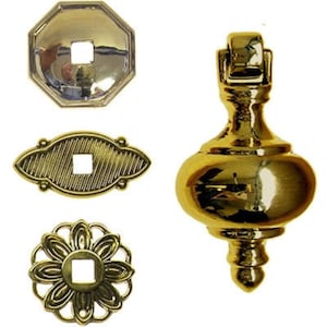 May include: Four gold-toned metal drawer pulls with different designs. The pulls have a square hole in the center for a screw.
