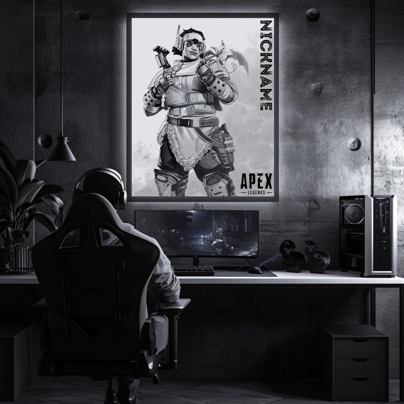 May include: A black and white illustration of a video game character from Apex Legends. The character is a woman with a large hammer and a helmet. The text "NICKNAME" and "APEX LEGENDS" is on the poster.