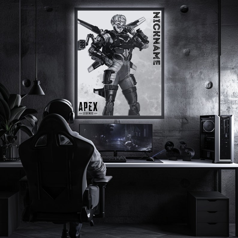 May include: A black and white poster featuring a character from the video game Apex Legends. The character is a woman wearing a futuristic suit and holding a weapon. The poster has the text "Apex Legends" and "NICKNAME" on it.