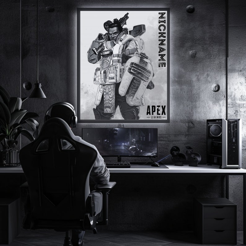 May include: A black and white illustration of a video game character from Apex Legends. The character is holding a gun and has a serious expression on their face. The image is framed and hanging on a wall in a dark room. The text "NICKNAME" and "APEX LEGENDS" is visible on the image.