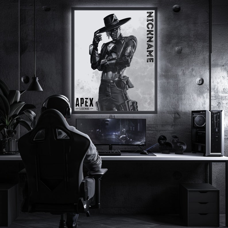 May include: A black and white poster featuring a character from the video game Apex Legends. The character is wearing a cowboy hat and a long coat. The poster has the text "Apex Legends" and "NICKNAME" on it.