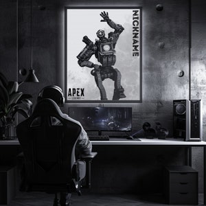 May include: A black and white illustration of a robot character from the video game Apex Legends. The robot is in a dancing pose with its arms raised. The text "NICKNAME" is written vertically on the right side of the image. The text "APEX LEGENDS" is written below the robot.
