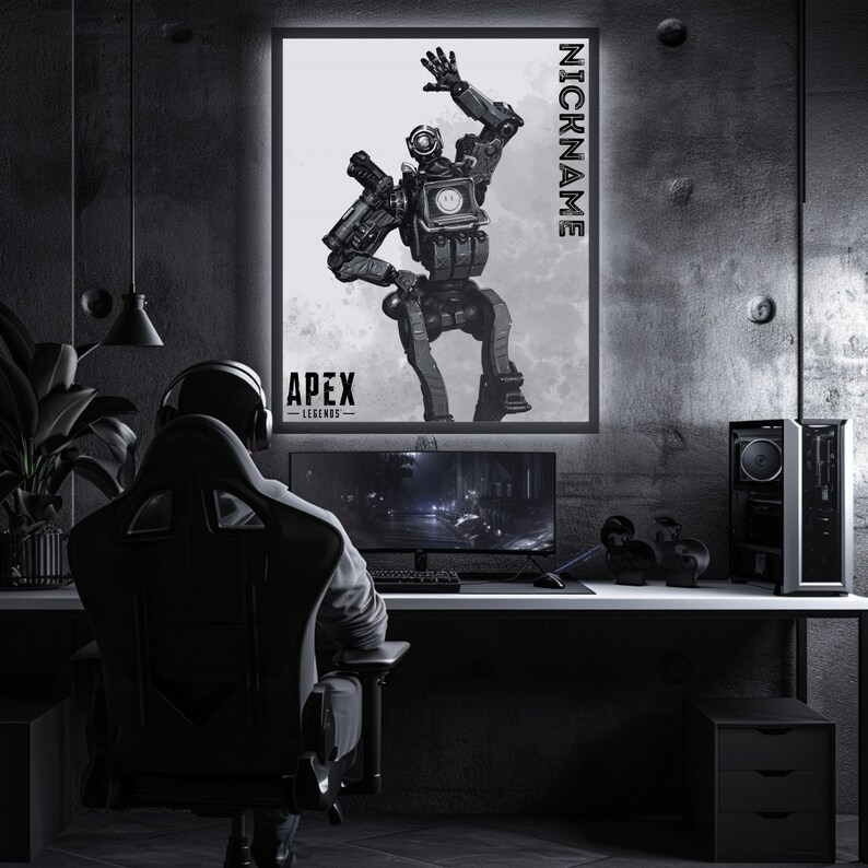 May include: A black and white illustration of a robot character from the video game Apex Legends. The robot is in a dancing pose with its arms raised. The text "NICKNAME" is written vertically on the right side of the image. The text "APEX LEGENDS" is written below the robot.