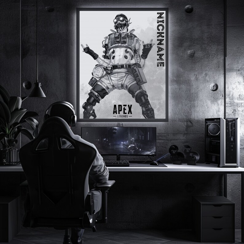 May include: A black and white illustration of a video game character from Apex Legends. The character is a cyborg with a gas mask and is holding a weapon. The text "NICKNAME" is written vertically on the right side of the image. The text "APEX - LEGENDS -" is written below the character.