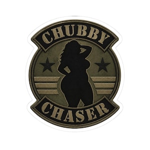 May include: A sticker with a military-style design. The sticker features the words "CHUBBY CHASER" in a curved banner, with a silhouette of a curvy person in the center. Two stars flank the silhouette.