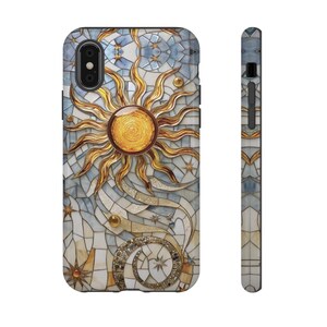 May include: A phone case with a mosaic design featuring a sun, moon, and stars. The design is in shades of gold, blue, and white.