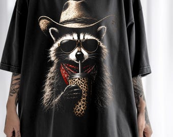 Cowboy Raccoon Shirt, Funny Coffee Lover Tee, Western Raccoon Graphic T-Shirt, Country Girl Shirt, Cute Animal Gift, Cowgirl Apparel