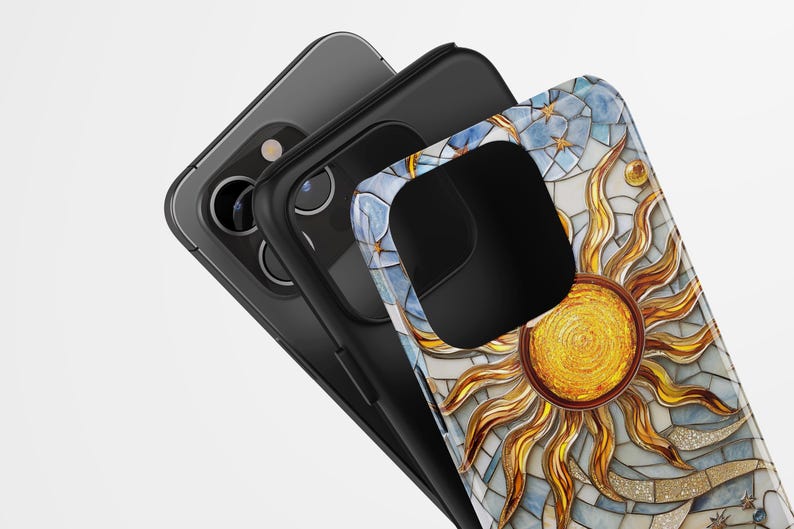 May include: A black phone case with a mosaic design featuring a gold sun and blue and white accents.