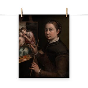 May include: A print of a Renaissance-era painting depicting a woman artist holding a paintbrush and palette, with a painting on an easel in the background. The woman is dressed in a dark dress with a white collar. The painting on the easel features two figures.