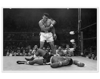 Muhammad Ali knocks out Sonny Liston Framed Poster