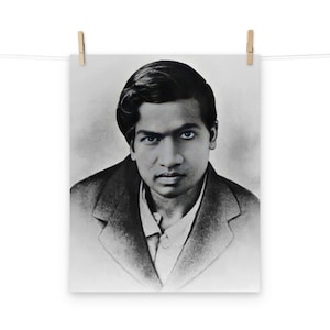 May include: Black and white portrait of a young man with dark hair and a serious expression. He is wearing a dark jacket and a light shirt.