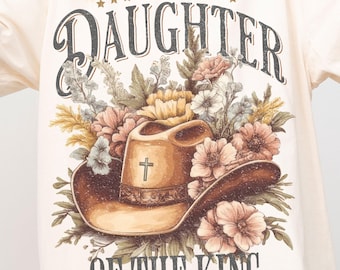 Maglietta da cowgirl cristiana, maglietta western figlia del re, regalo per donna con versetto della Bibbia Comfort Colors, maglietta floreale ispirata alla fede di Gesù