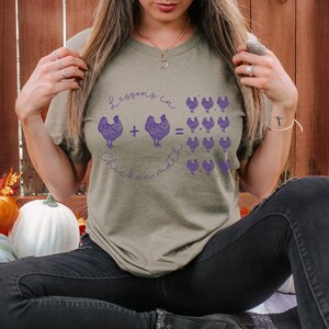 Get this hilarious chicken math t-shirt where one plus one always equals more than two. A great gift for chicken lovers, roosters, and peckers fans, and a fun addition to any chicken mom's wardrobe.