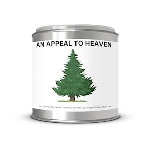 May include: A silver tin candle with a green pine tree illustration and the text "AN APPEAL TO HEAVEN". The text below the image reads "16oz Coconut Soy Candle | Hand-Poured in the USA - Vegan | 70 Hours Burn Time".